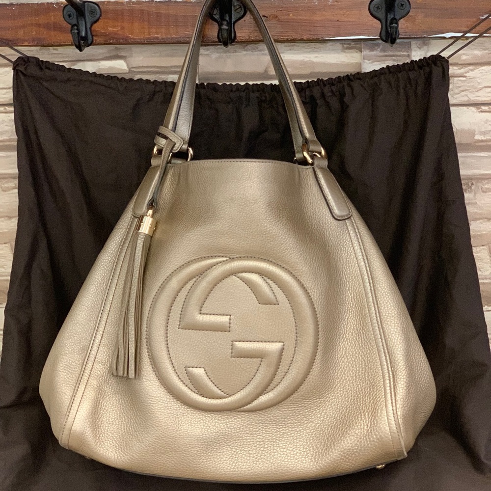 BARELY USED. PRISTINE CONDITION Gucci Gold Bag